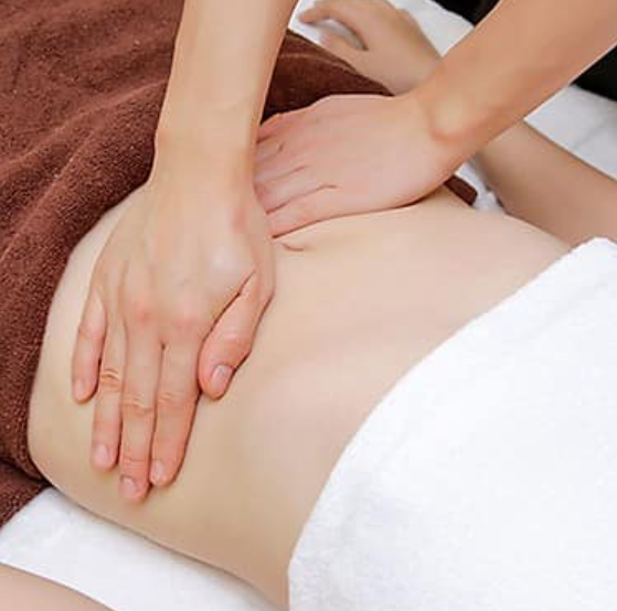 massage trị giảm béo bụng sau sinh
